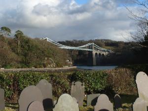 St Tysilio Church Island - Menai Straits, Anglesey.  Thomas Telford's Suspension Bridge in the Background