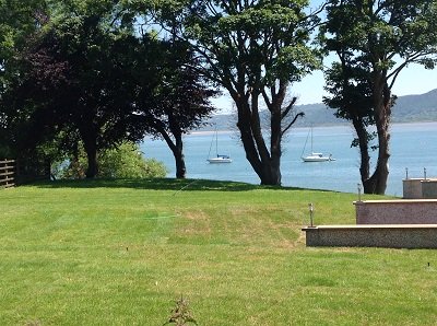 Red Wharf Bay through the trees - www.anglesey-hidden-gem.com