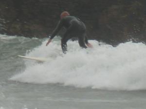 Surfing at Cable Bay